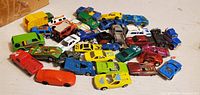 Top-down view of entire assortment of vehicles spread on table