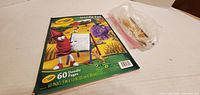 Front view of Crayola Doodle Pad and bag of pencils