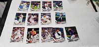 Fronts of all 14 Topps baseball cards laid out in three rows