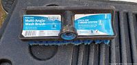 Front of Unger wash brush head showing label and Lock-On connector