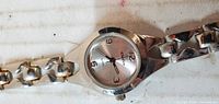 Front view showing dial, case, bracelet