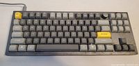 Top view showing full key layout, knob and color scheme