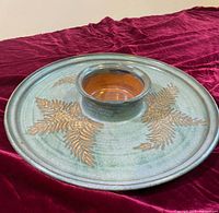 Top view showing full platter and central bowl, glaze and motif visible