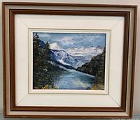 Full view of framed painting showing artwork and frame
