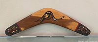 Full view of wooden boomerang front side