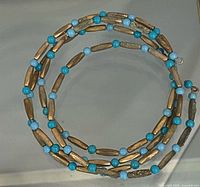 Full view of coiled wrap bracelet showing bead pattern