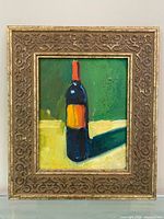Frontal view of framed oil painting showing subject and frame detail