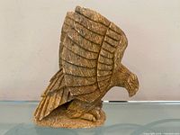Full side view of soapstone eagle carving