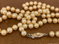 Close-up of pearls and clasp detailing