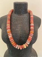 Full view of necklace on display bust