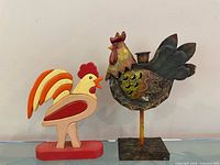 Both rooster figures front view displaying size and colour
