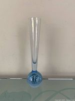 Full view of vase front, showing blue bubble base and clear neck