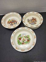 Group shot of three Bunnykins bowls showing interior designs and border