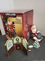 Boxed Kirkland Fabric Mache Santa, chimney Santa, fireside backdrop, tree and footstool grouped