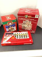 Three boxed items: two village house boxes and lamp post box