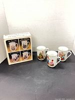 Boxed set of four mugs and three loose mugs overview