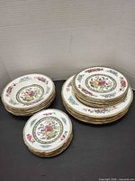 Stacks of Paragon Tree of Kashmir plates and bowls