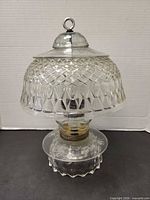 Full view of pressed glass lamp front