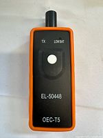 Front view showing model number, button and indicator LEDs