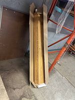 Mantel shelf inside opened carton