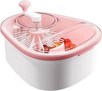 Top view showing pink lid, clear section, rotating brush and crank handle