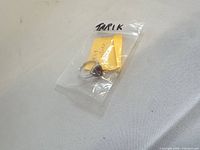 Ring in bag with note, full lot overview
