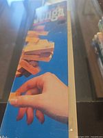 Front of Jenga box showing branding and wooden blocks