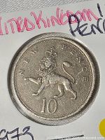 Reverse view showing crowned lion and denomination
