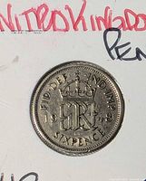 Reverse of 1948 sixpence showing crowned GR monogram and date