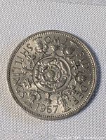 Reverse showing Tudor rose design and denomination