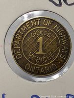 Front view of token showing full inscription and design