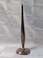 Full view of tall slender silver plated bud vase