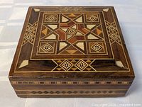 Lid view showing full marquetry pattern