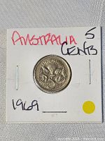 Reverse side of 1969 Australian 5 cent coin in 2x2 flip