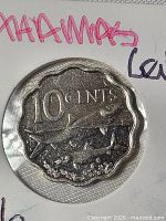 Reverse of 2016 Bahamas 10 cents coin with fish design