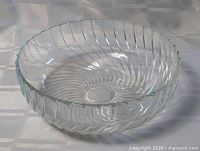Top angled view showing overall form and swirl pattern base