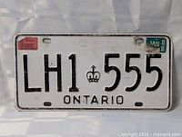 Full view of Ontario LH1 555 licence plate showing complete front