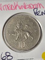 Reverse showing crowned lion and denomination 10 NEW PENCE
