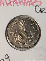 Reverse side of 1969 Bahamas five cents coin close-up