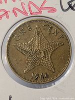 Close-up of coin reverse showing starfish design and date 1966