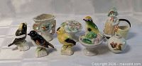 Group shot of all nine ceramic and porcelain pieces