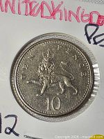 Reverse showing crowned lion and denomination TEN PENCE 10