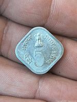 Obverse with Lion Capital, numeral 5, legends, square rounded shape