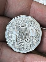 Reverse side showing coat of arms and 50 denomination