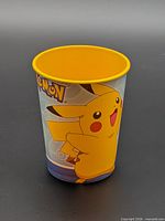 Front view showing Pikachu graphic and yellow interior