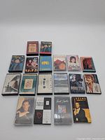 Front view of all cassette tapes laid out on white surface