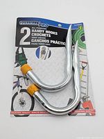 Front of sealed Duramax Pro package showing two steel hooks with yellow tips
