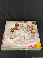 Retail box front displaying image and product details of Fruit Delight embossed glass divided platter