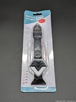 Front view of sealed silicone trowel & scraper in blister pack