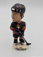 Front view showing player likeness, base label, uniform details